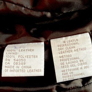 Brown leather bottom down jacket. Barely worn. Great condition. Lined pockets.
